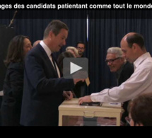 Les images des candidats patientant comme tout le monde pour aller voter