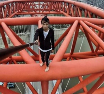 ( 05 Photos ) Un «rooftopper» chinois filme involontairement sa propre mort alors qu’il plonge du haut d’un gratte-ciel de 62 étages